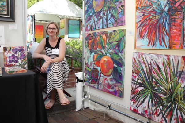 An artist displays her work at the Autumn Art Festival in Winter Park