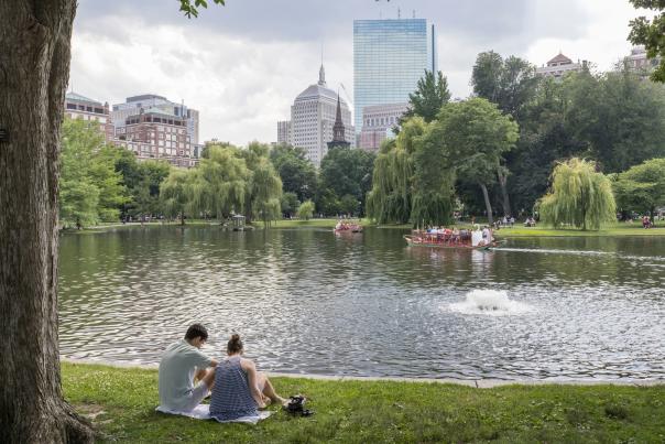 Two people picnicking on the Public Garden
