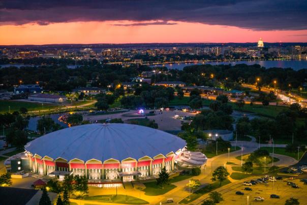 Aerial image of Alliant Energy with the sun setting in the background