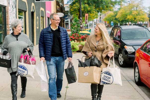Man and two women shopping in downtown Green Bay