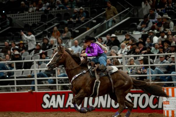 Woman riding horse at San Antonio Stock Show & Rodeo