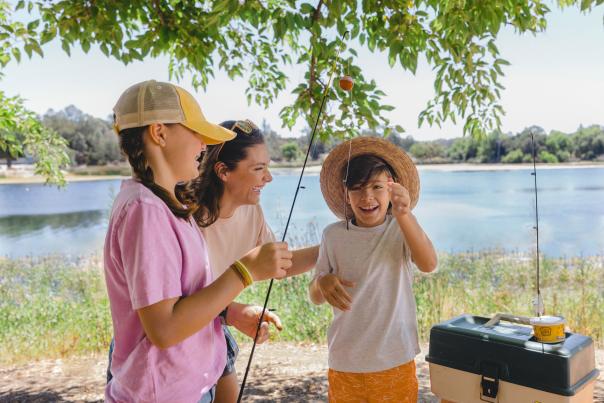 mother with children fishing at Atascadero Lake Park