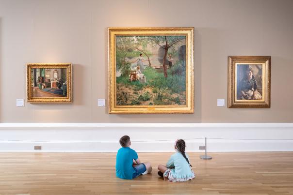 Two children at Ulster Museum looking at artwork