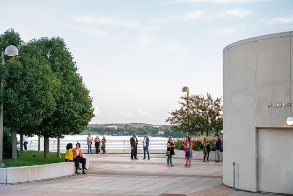 Chicago business professionals gather and network on the rooftop of Monona Terrace in Madison, WI