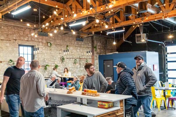 people drinking beer at the bar of local brewery woodland republic in rapid city, sd