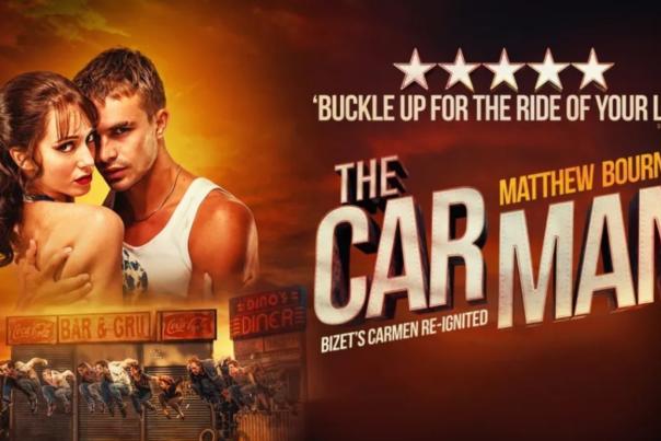 The Car Man poster. A man and a woman in 1950's clothing stand together. Underneath is a picture of dancers in front of a stage set of a garage. There are 5 white starts along the top of the poster and it says 'Buckle up for the ride of your life'.