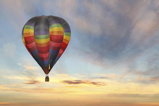 colorful hot air balloon in a sunrise sky