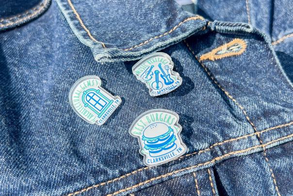 denim jacket with three collectible pins