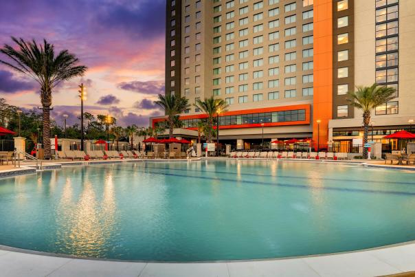 Pool at Drury Plaza Hotel Orlando at dusk