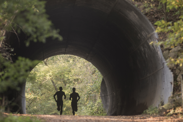 Two people running on the Putnam trail in Eau Claire, WI