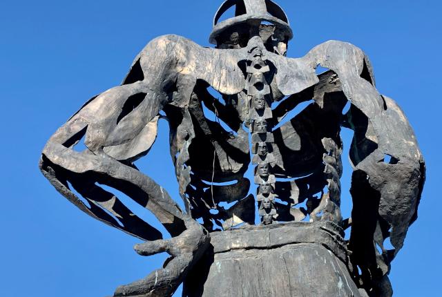 Untitled Coalminer #1 stands outside the Miners’ Colfax Medical Center, New Mexico Magazine