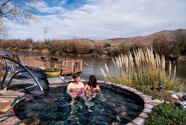 Newlyweds relax at Riverbend Hot Springs in Truth or Consequences
