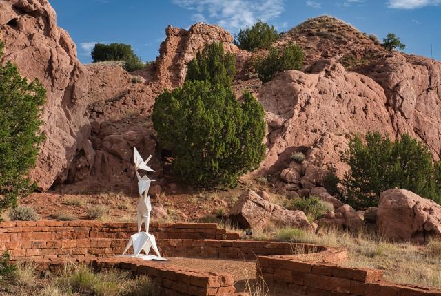 Kevin Box’s Crane Unfolding soars in his Turquoise Trail Sculpture Garden and Studio, New Mexico Magazine