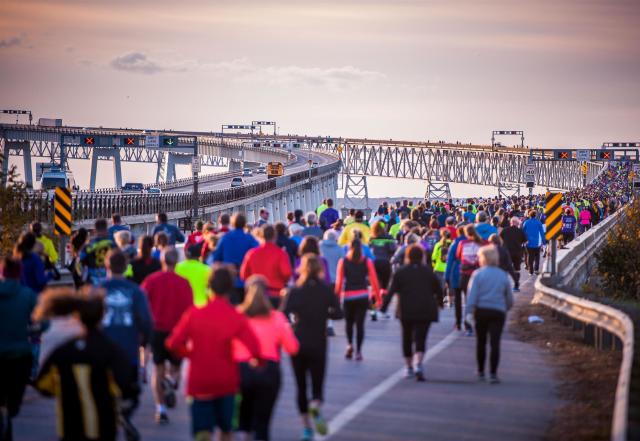 Runners running across the Chesapeake Bay Bridge