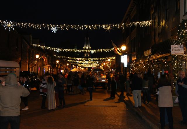 The canopy of lights over West Street at night during the Chocolate Binge Festival