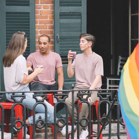 LGBTQ Friends Having Drinks on a French Quarter Balcony