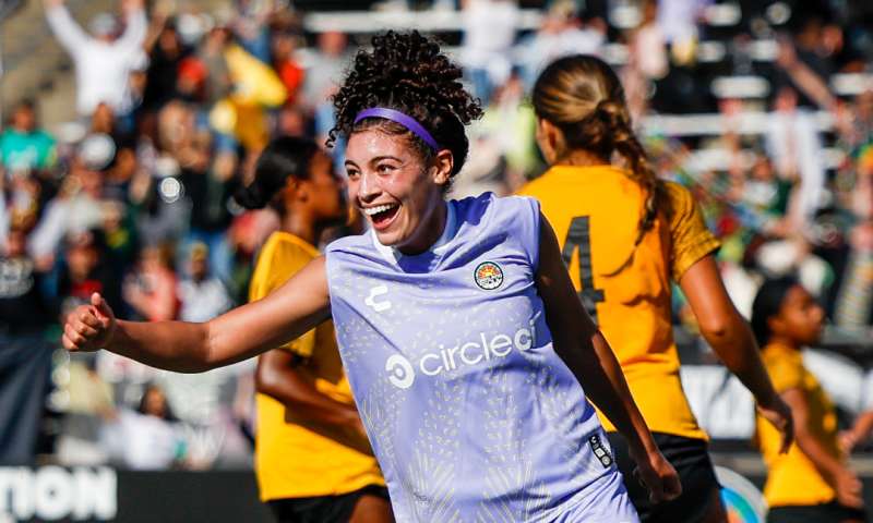 Oakland Soul player celebrating a goal