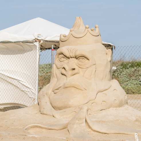 Sand sculpture of a monkey king looking haughty