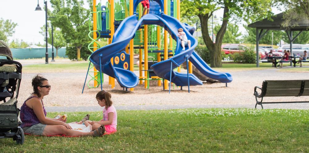 A family relaxing at Kershaw Park overlooking Canandaigua Lake