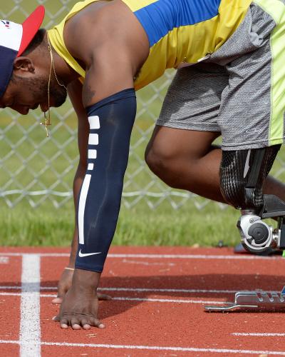 Adaptive Runner Prepares to Start Race Disabled Sports US