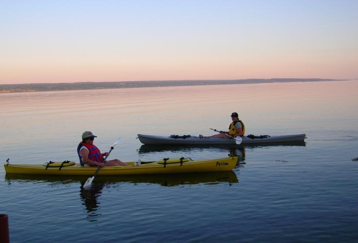 Two kayakers on Cayuga Lake