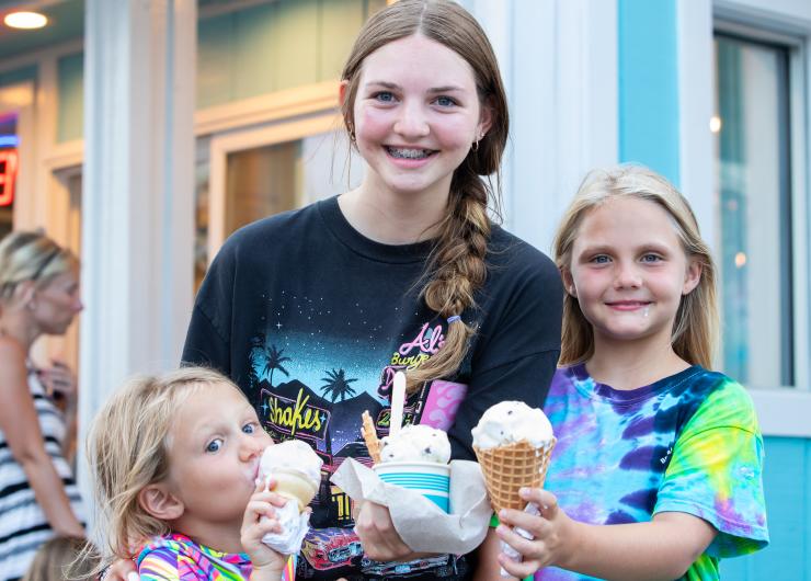 3 young girls enjoy ice cream from Melt at Music on Main
