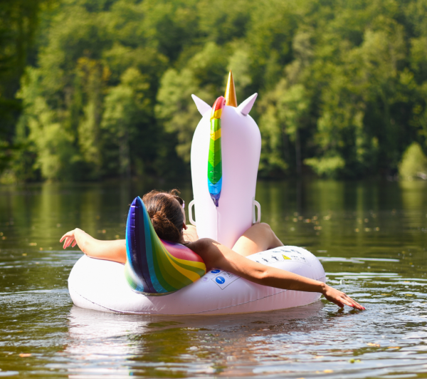 Women Floating on Lake