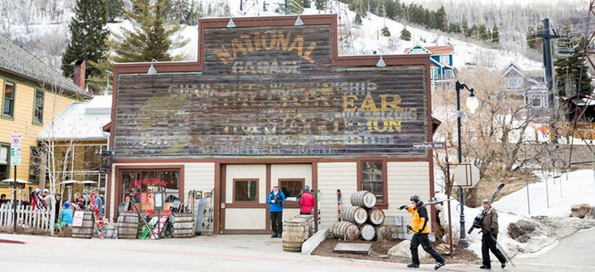 Exterior of High West Distillery with skiers walking by