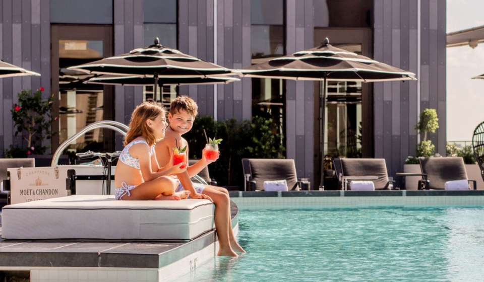 Kids Hanging Out at the Four Seasons New Orleans Pool