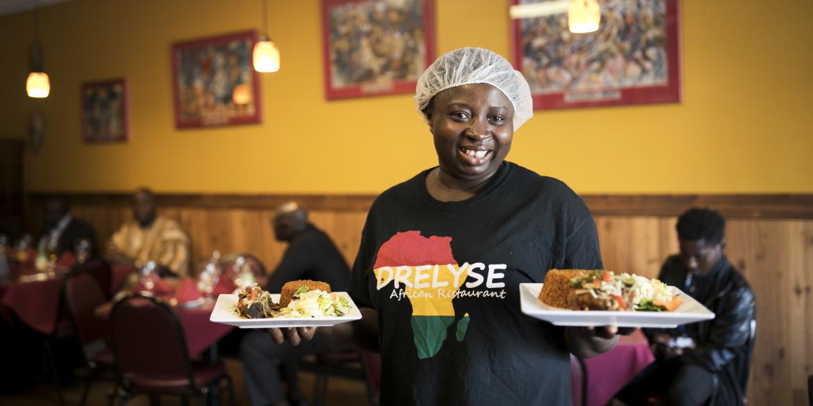 Serving food at Dreylse Africa Restaurant