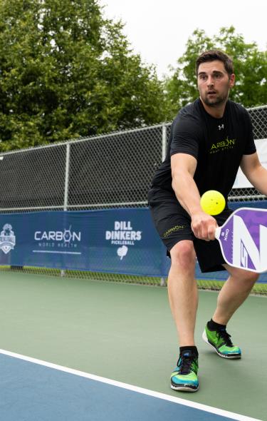 Pickleball player hitting the ball at the 2025 MPO in Sun Prairie, WI