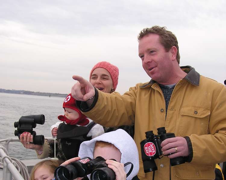 Family on Save The Bay Seal Watch Cruise (tour in Newport, photo can also represent Westerly cruises).