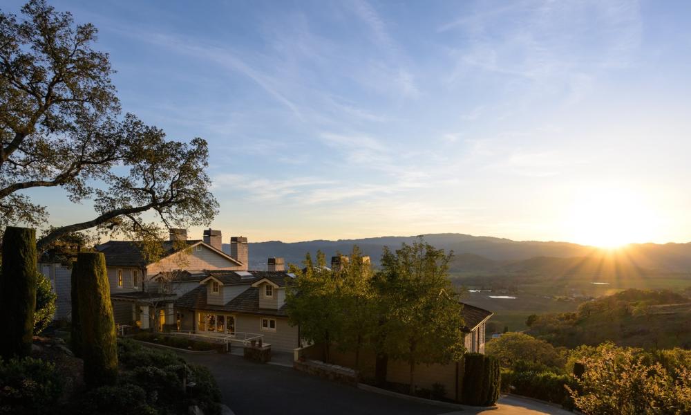 The sun sets over the hills in the Stags Leap District near Napa Valley's Poetry Inn.