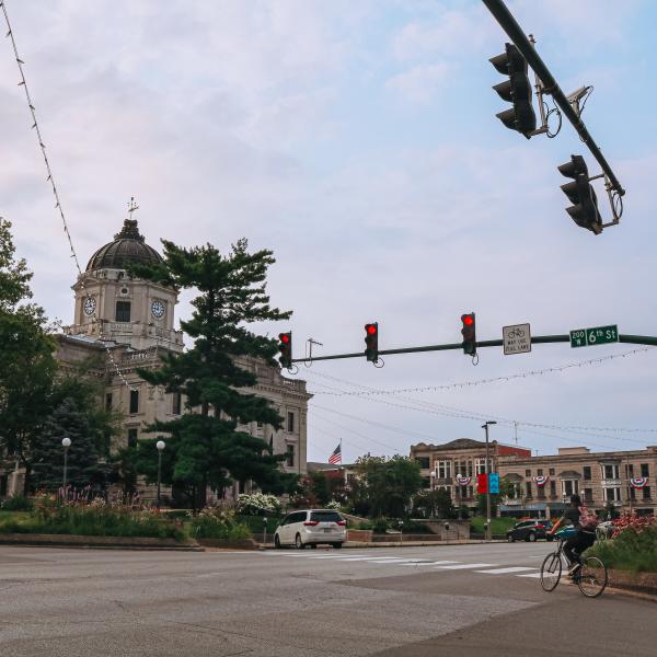 A person riding a bike on The Square