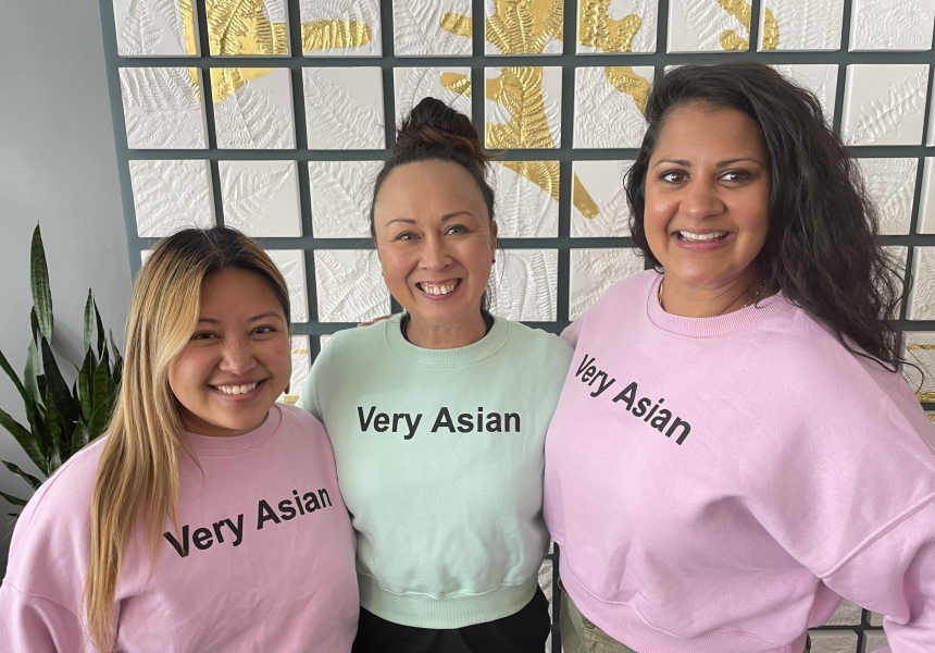 Three women wearing sweatshirts that say "Very Asian"