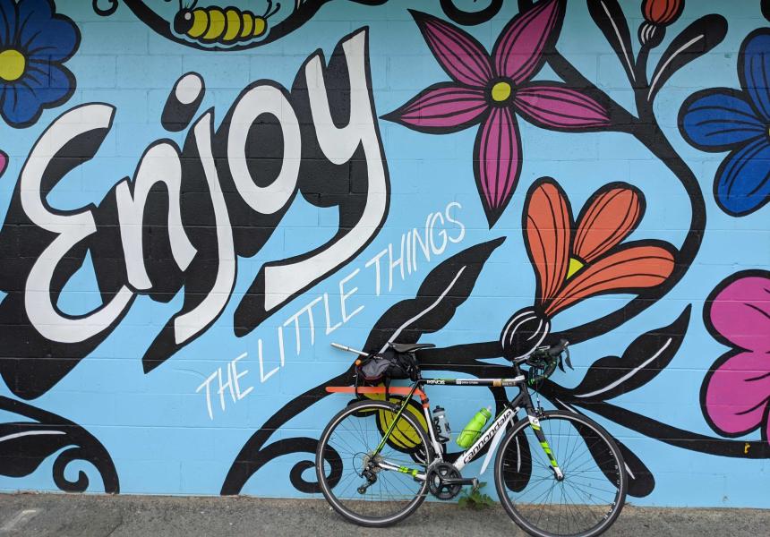 Bike in front of mural