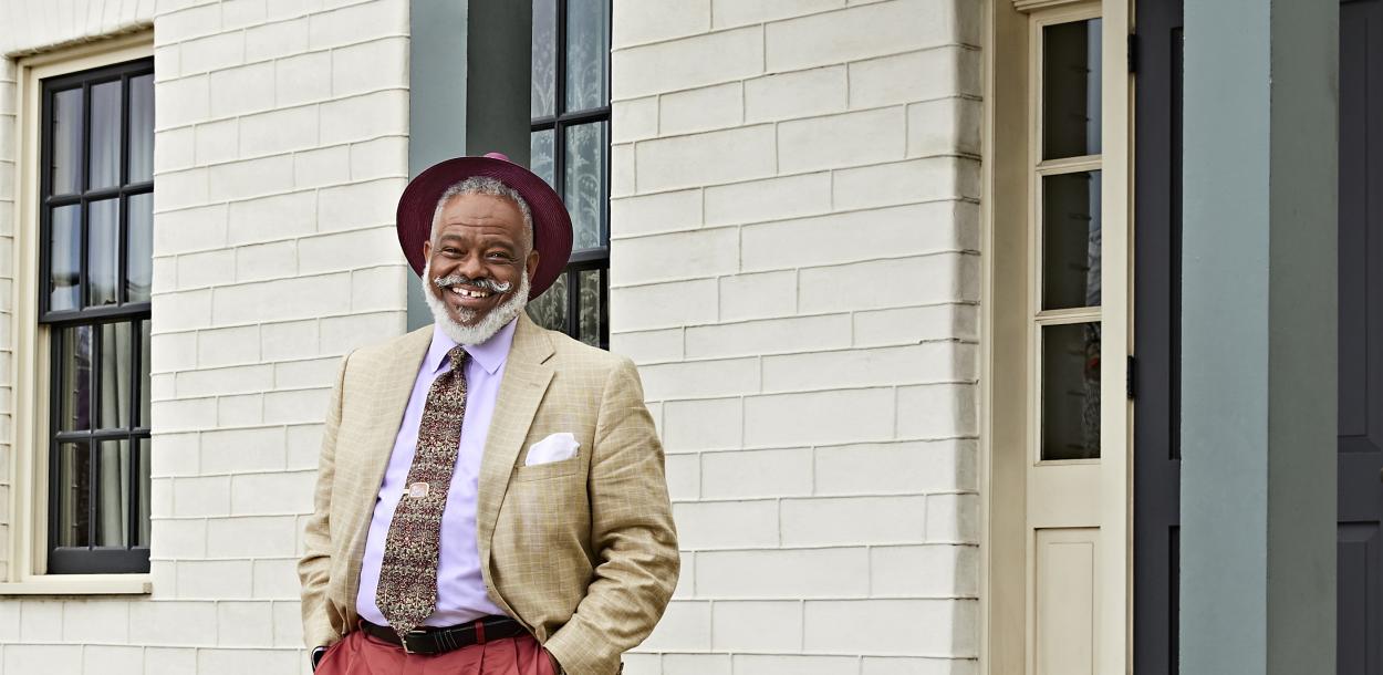 Austin tour ambassador Harrison Eppright standing outside the historic Susanna Dickinson House Museum