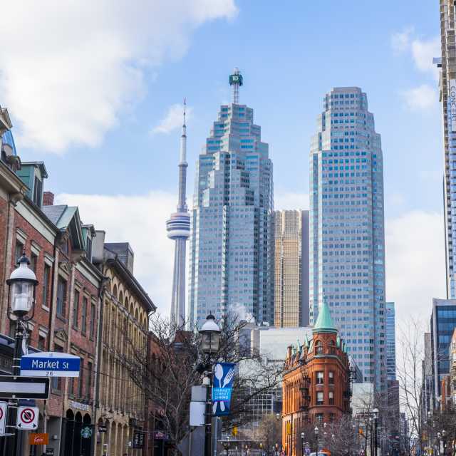 A view of the city skyline and Gooderham & Worts building from the Old Town neighbourhood on Front Street