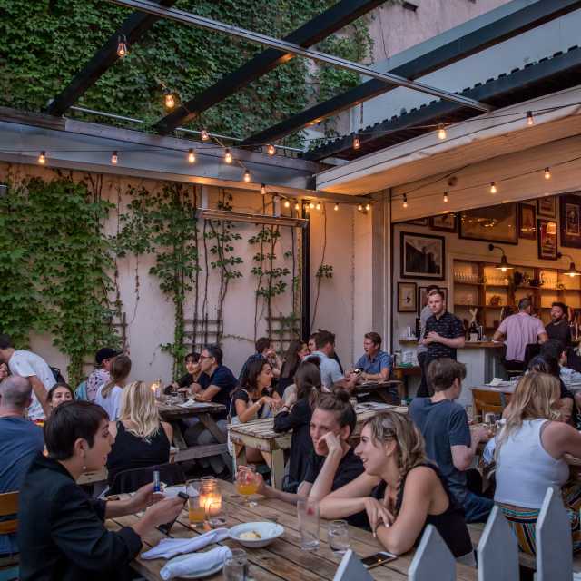 The outdoor patio at Bellwoods Brewery on Ossington Avenue in summer