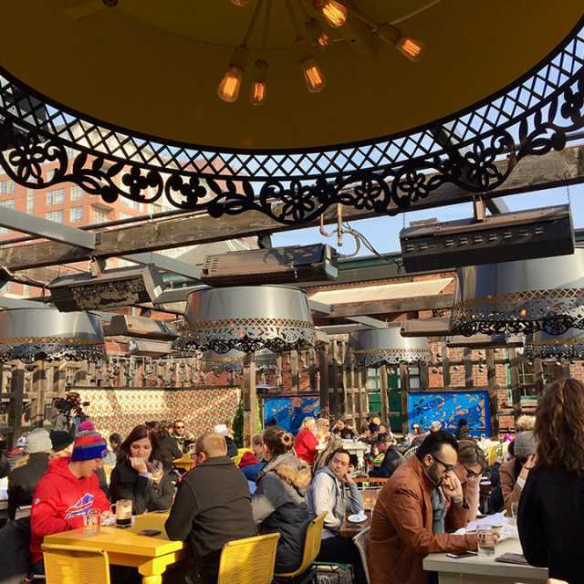 Customers dining on El Catrin's patio in the winter