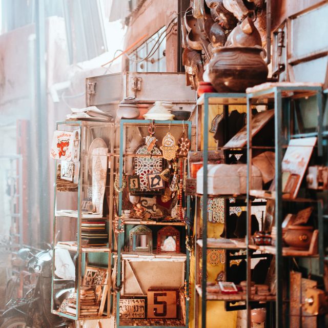 Objects on shelves at a flea market