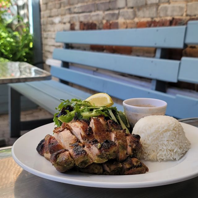 A rice dish on the patio at Queen Mother in Toronto, Ontario
