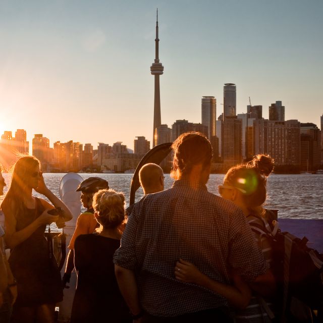 A sunset view of the Toronto skyline from the Centre Island ferry