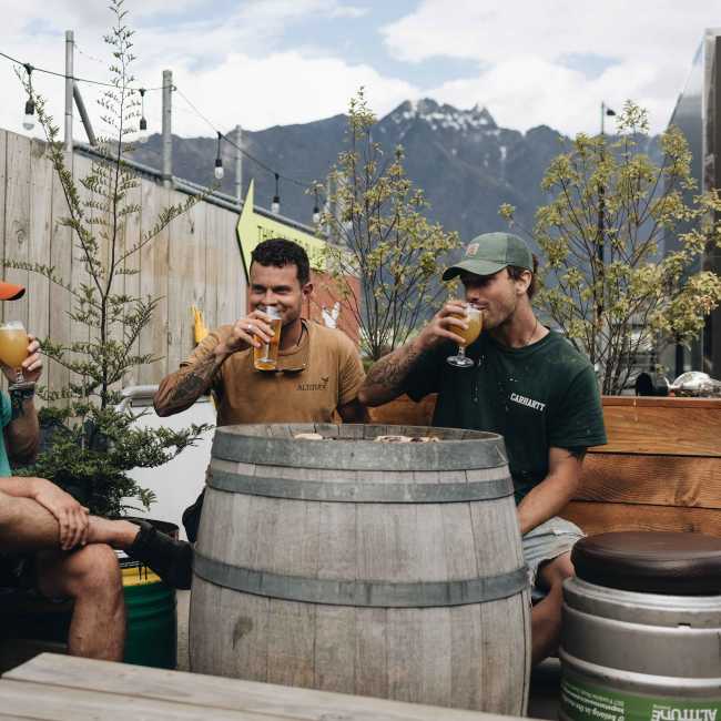 Friends having a beer at Altitude Brewing Beer Garden