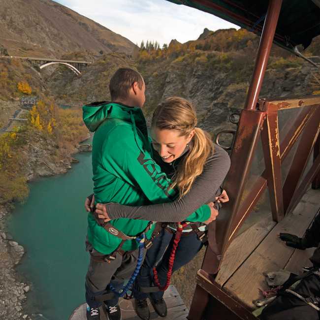 Couple jumping at the Kawarau Bungy in Autumn