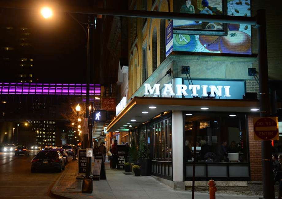 Martini sign on North High Street at night