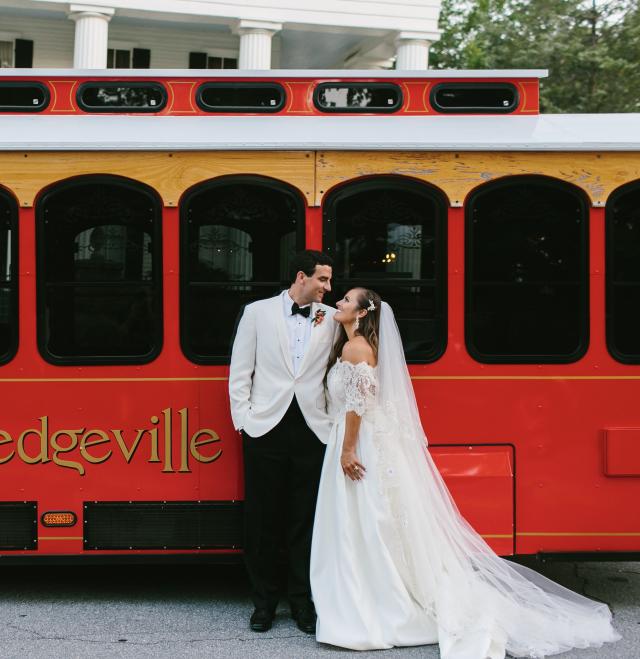 Married Couple in Front of Milledgeville Trolley