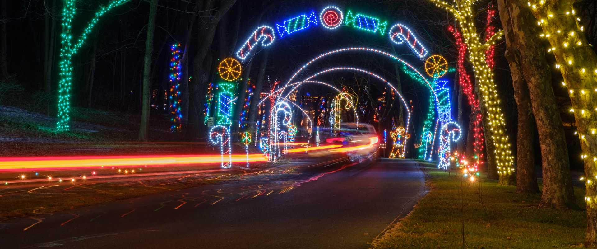 A car drives through Lights in the Parkway, Allentown