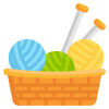 a graphic of a basket with three balls of yarn and knitting needles