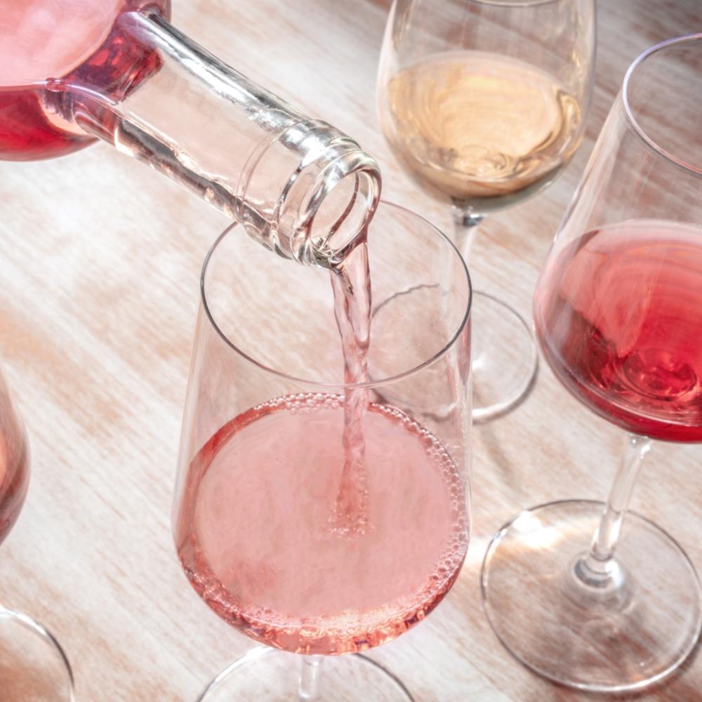 Wine being poured into glasses